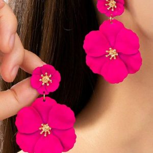 Aretes dobles de flor fucsia