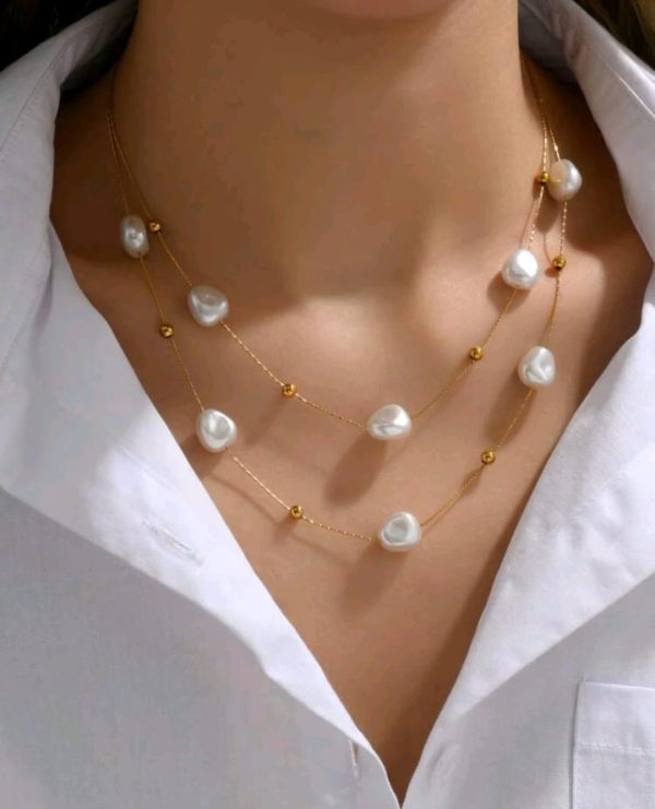 Collar de doble cadena con perlas
